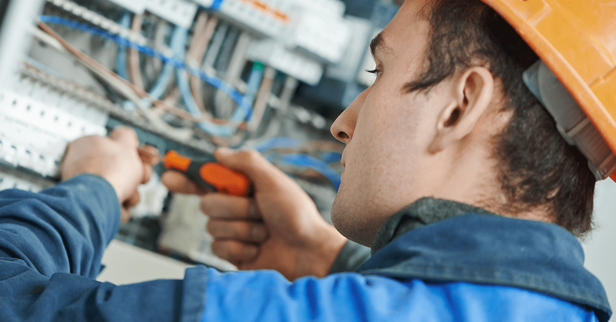 man upgrading electrical work